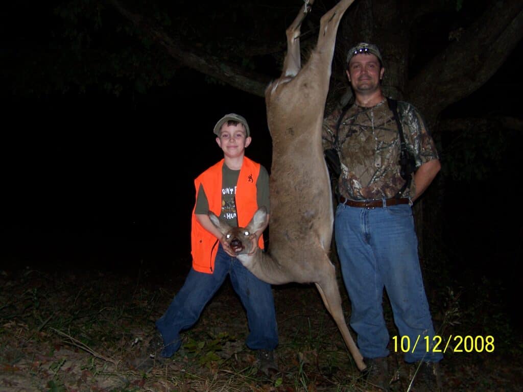 Patrick Long and Tony Long with a deer